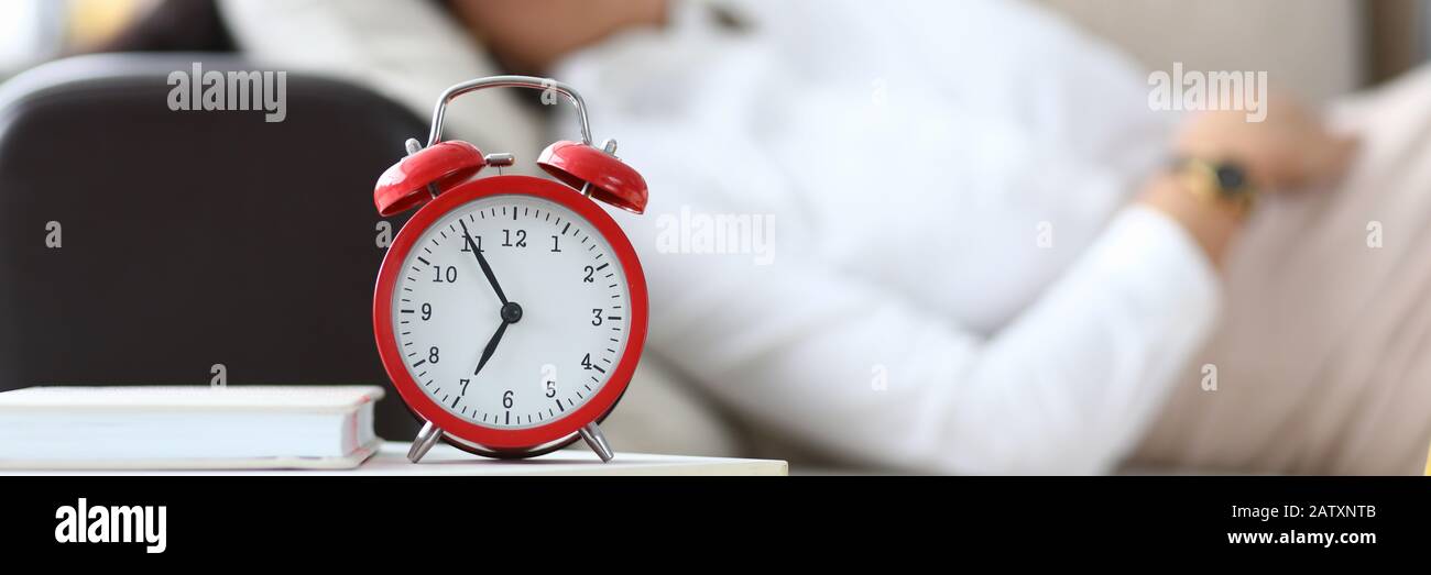 Slumbering female worker Stock Photo