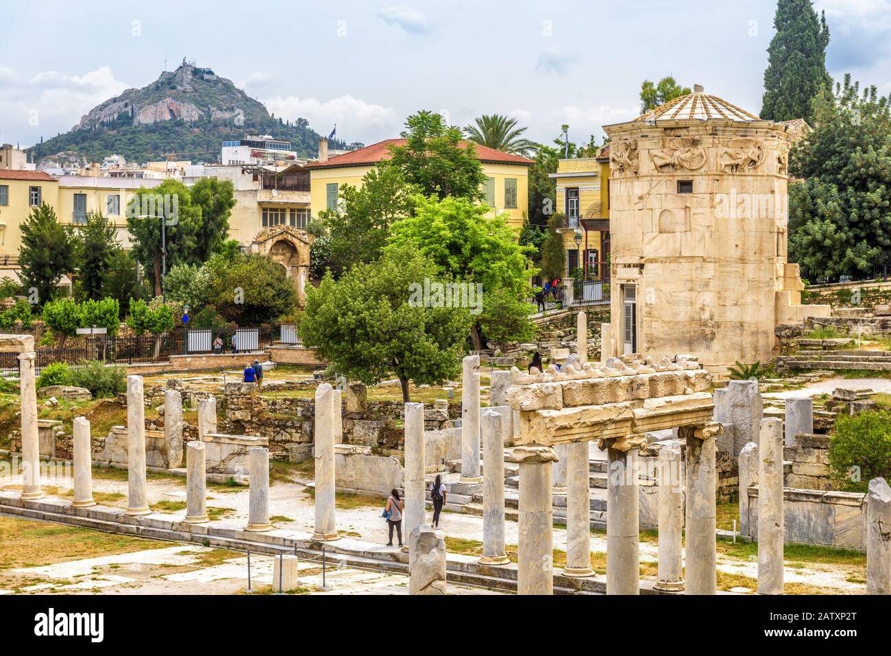 Roman Agora with Tower of Winds or Aerides, Athens, Greece. This place is a landmark of Athens. Panorama of Ancient Greek ruins in Athens center at Pl Stock Photo