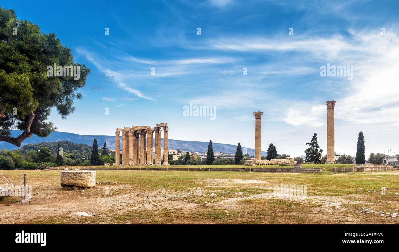 Ruins of Temple of Olympian Zeus in Athens, Greece. The ancient Greek Temple of Zeus or Olympieion is one of the main landmarks of Athens. Panoramic v Stock Photo