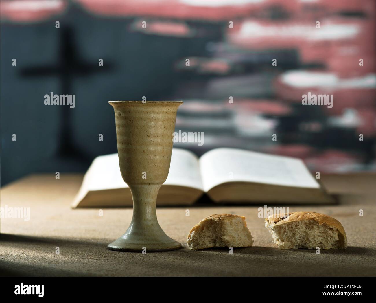 Still life with chalice of wine and bread Stock Photo