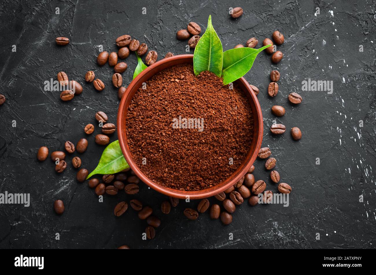 Ground coffee and coffee beans. Assortment of coffee varieties on a