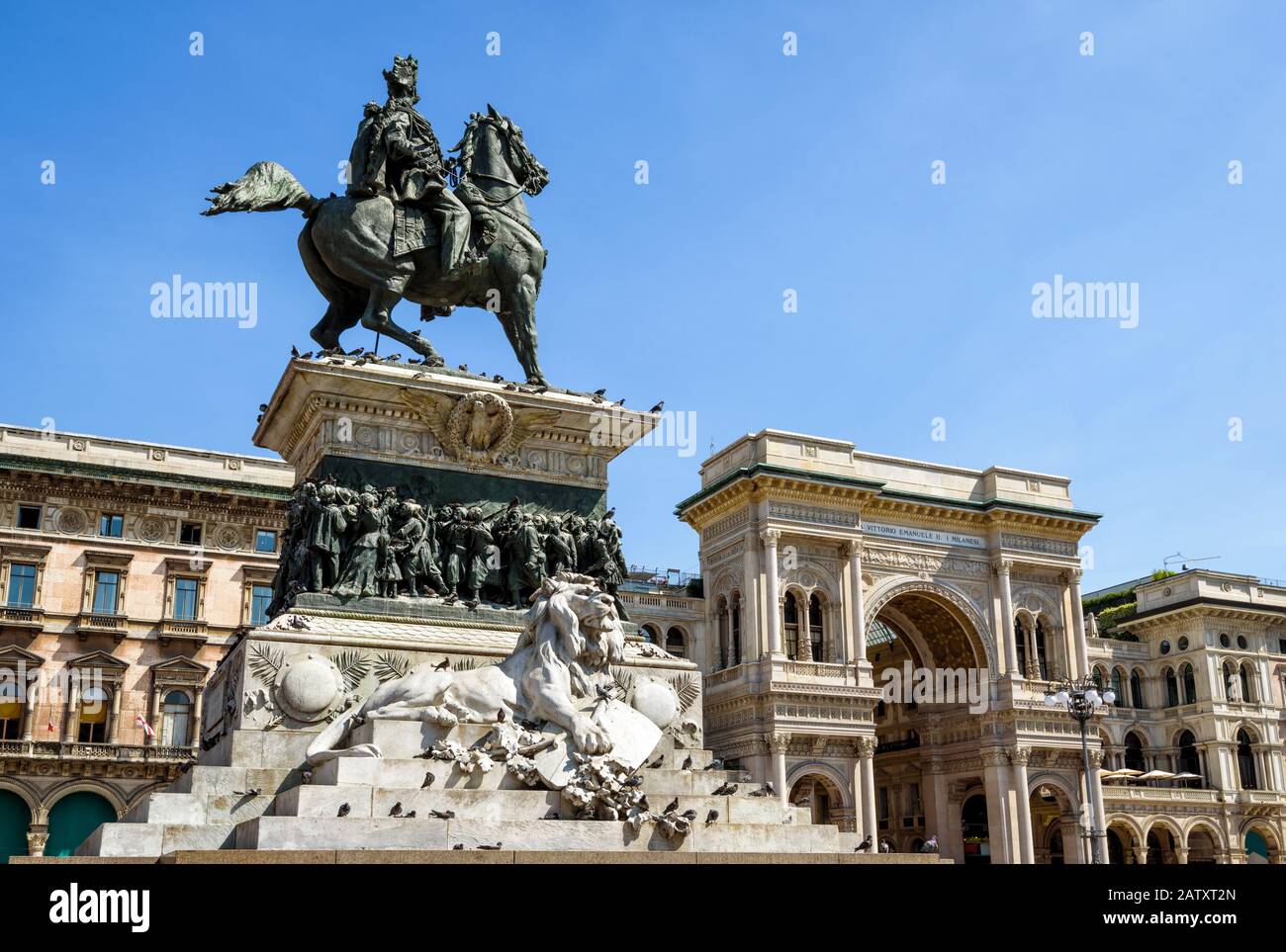 Monument to Vittorio Emanuele II and Galleria Vittorio Emanuele II on the Piazza del Duomo (Cathedral Square) in central Milan, Italy. This gallery is Stock Photo