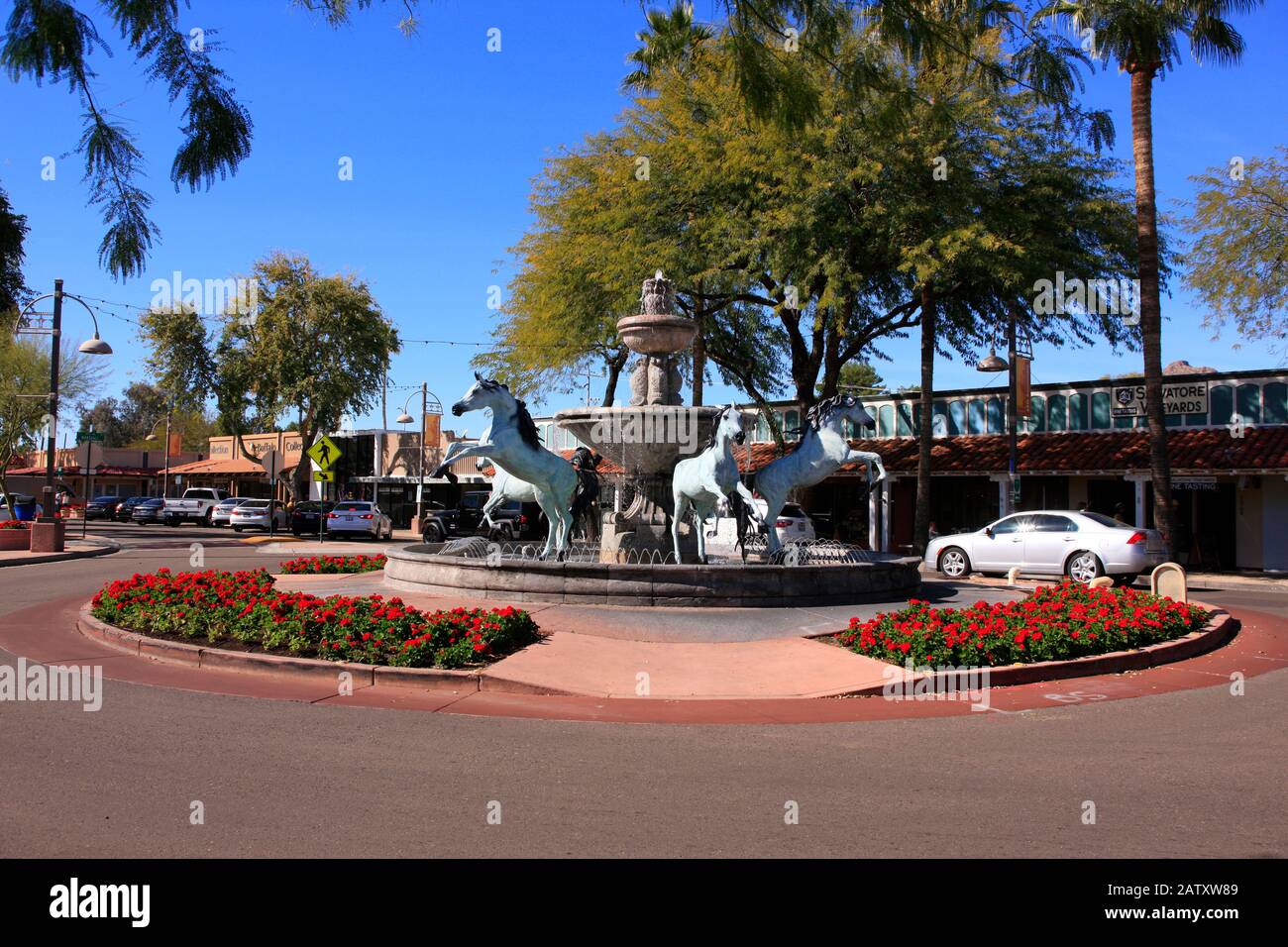 Bronze Horses Fountain in the 5th Ave shopping district of Old Town Scottsdale AZ Stock Photo
