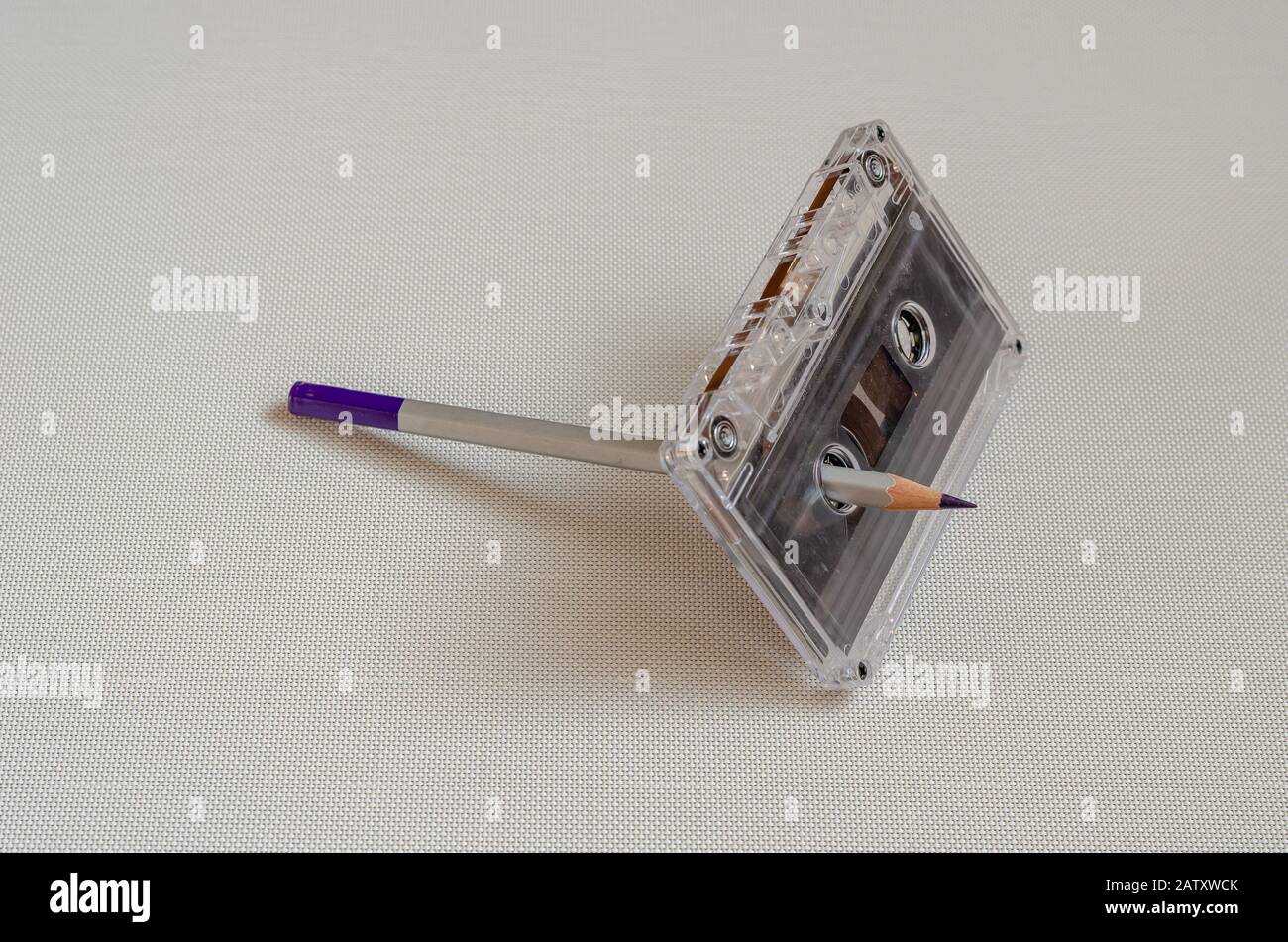 Used a pencil inserted into the tape to rewind the film manually. Do