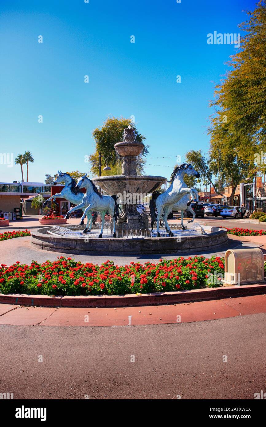 Bronze Horses Fountain in the 5th Ave shopping district of Old Town Scottsdale AZ Stock Photo