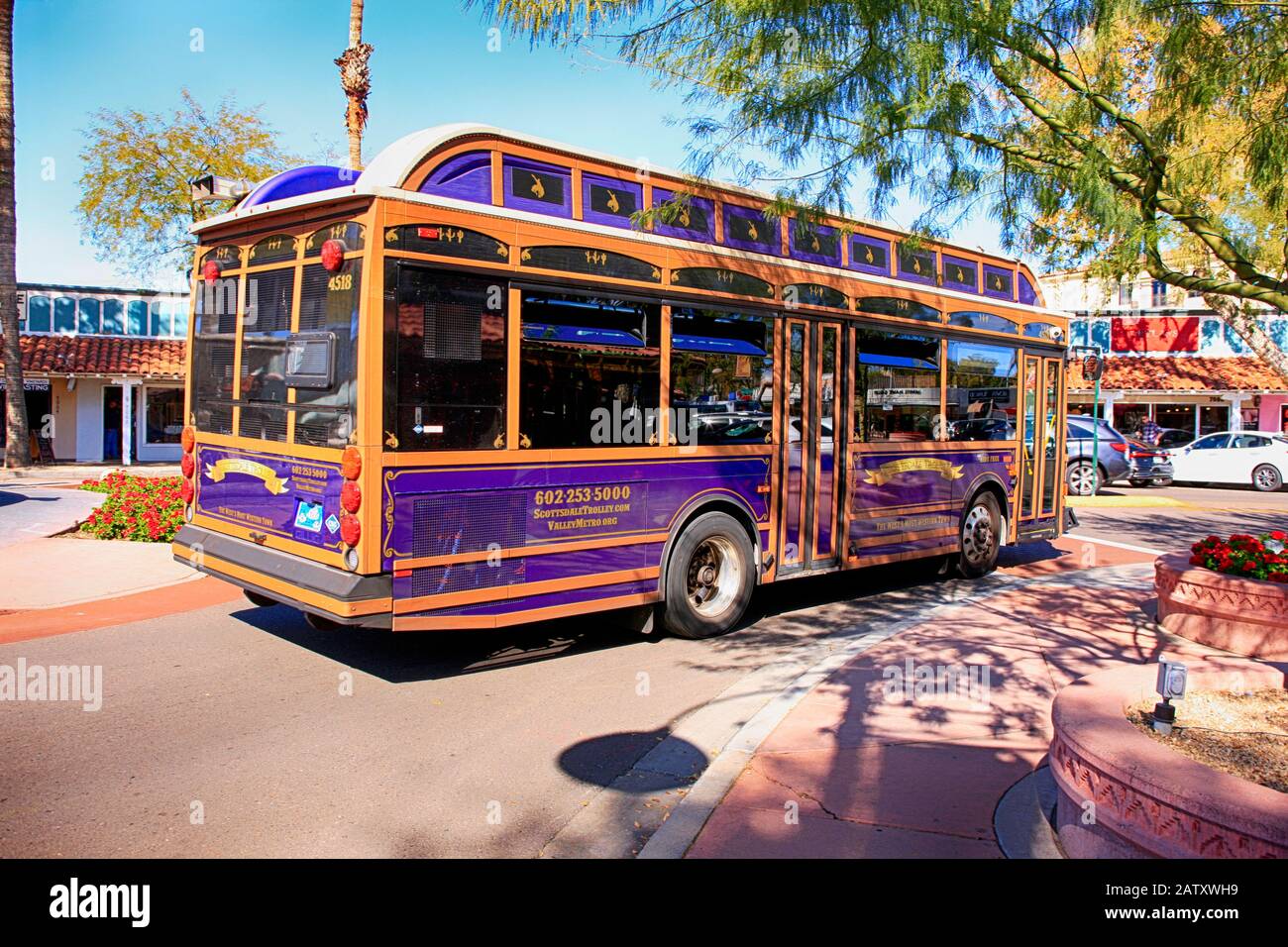 Free bus shuttle that drives around Old Town Scottsdale AZ seen near the Bronze Horses fountain Stock Photo