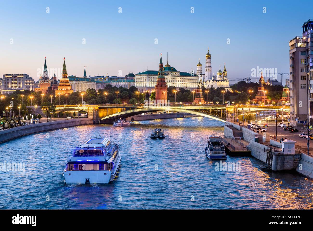 Moscow Kremlin at night, Russia. Beautiful view of the Moscow city center in evening. Panorama of famous Moscow Kremlin and Bolshoy Kamenny Bridge. Mo Stock Photo