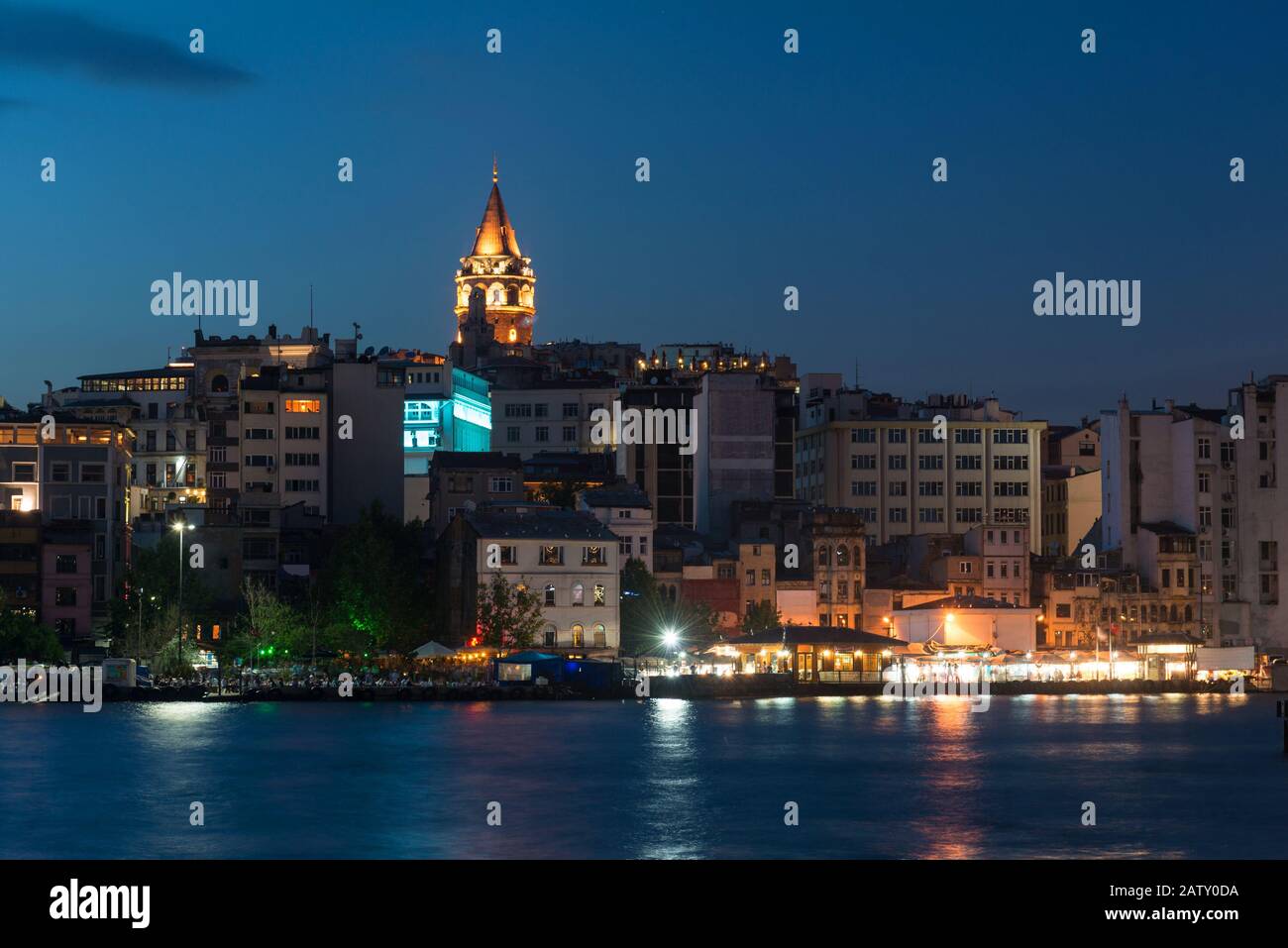 View of Galata district with Galata Tower at night, Istanbul, Turkey ...