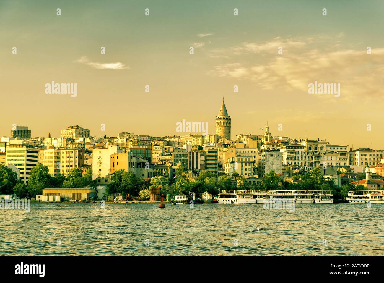 Cityscape with Galata Tower over the Golden Horn at sunset, Istanbul, Turkey Stock Photo