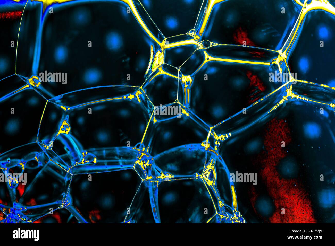 Oil bubbles inside water base form patterns Stock Photo - Alamy