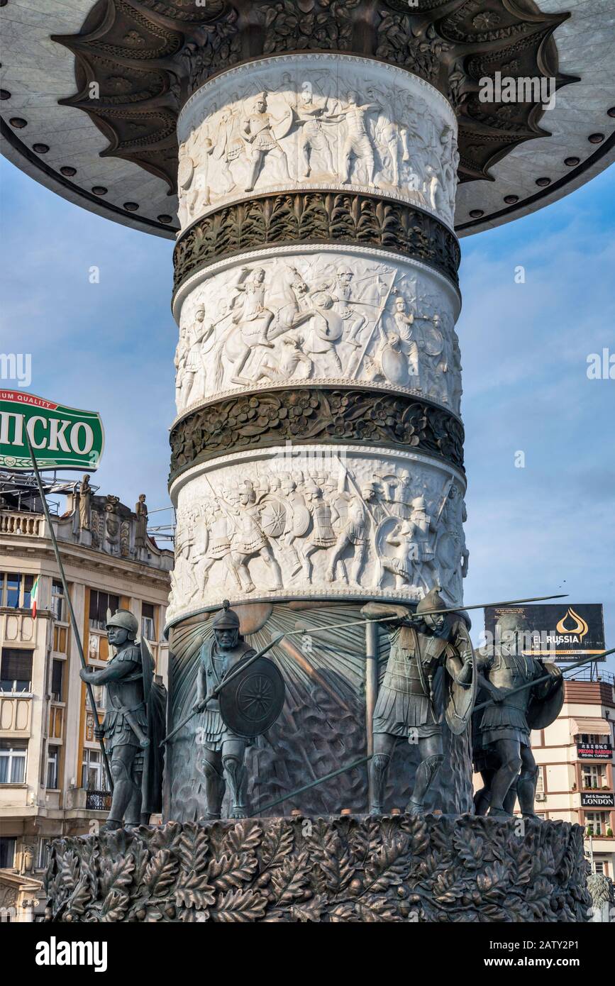 Sculptures and low reliefs at column supporting Warrior on a Horse statue, current official name of Alexander the Great monument in Skopje, North Mace Stock Photo