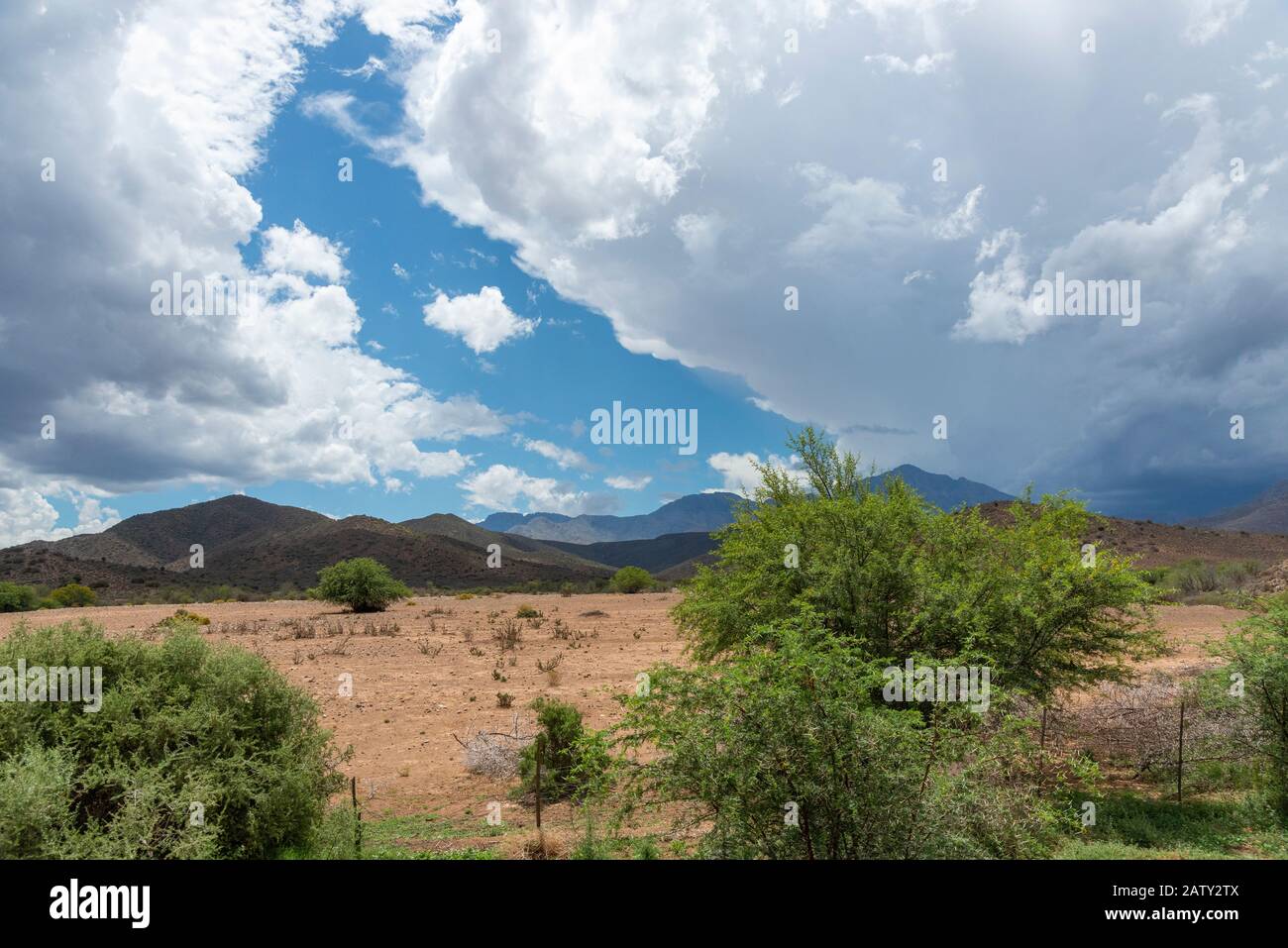 The Karoo barren landscape with spectacular cloud formations forming over the mountains, South Africa Stock Photo