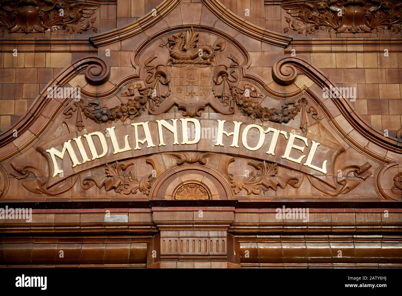Manchester landmark Midland Hotel sign on the tiled victorian exterior of a ex railway hotel Stock Photo