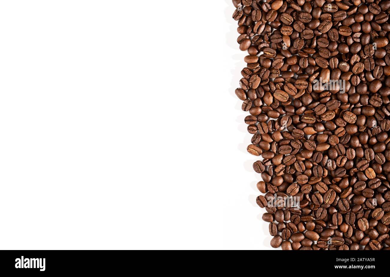 Coffee beans on a white background with place for text Stock Photo - Alamy