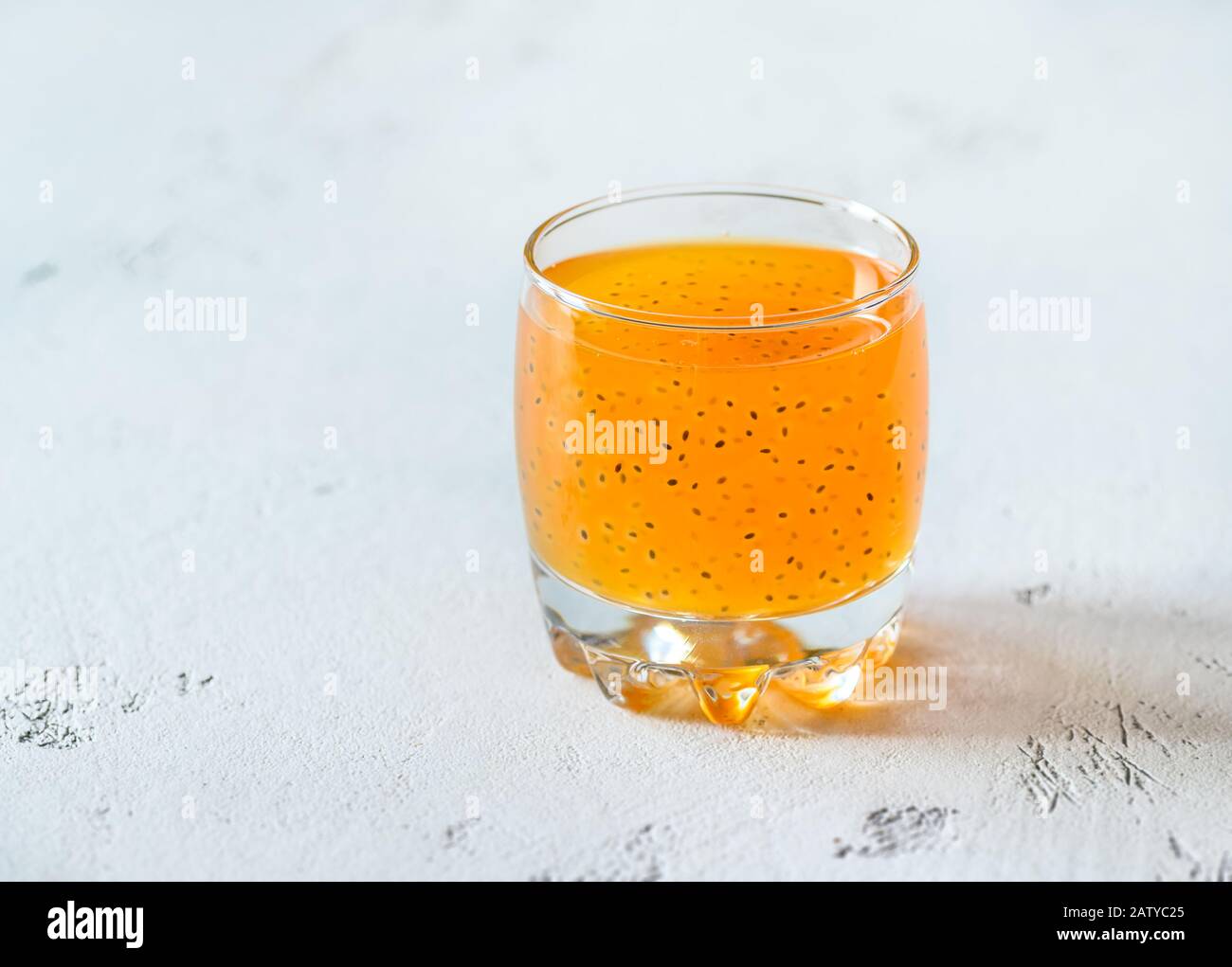 Glass of orange juice with basil seeds Stock Photo Alamy