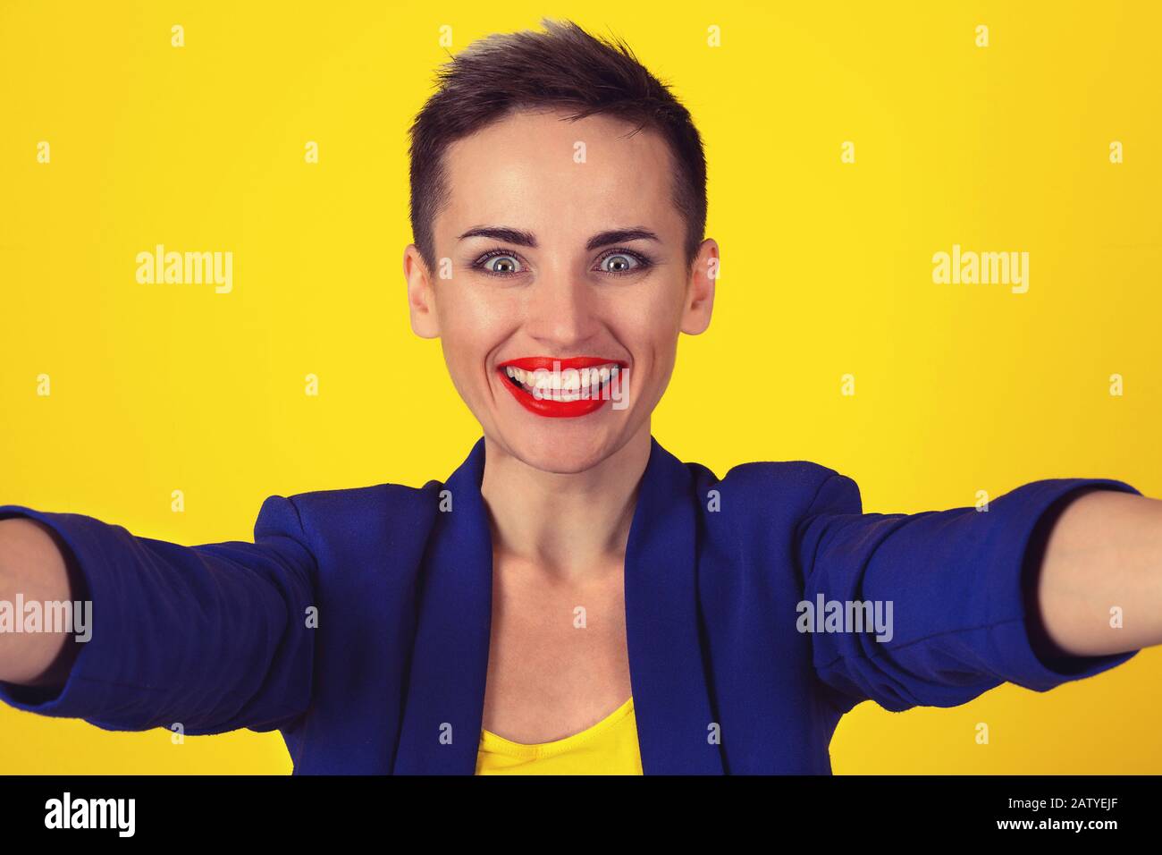 Happy, selfie shot. Closeup excited woman short hair girl smiling while