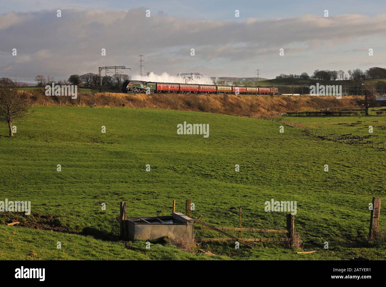 A4 60009 heads along the WCML at Bay Horse nr Lancaster. Stock Photo