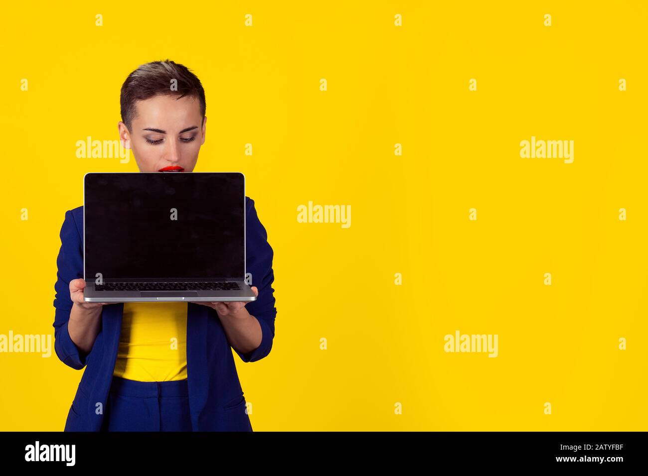 Woman Head Over Computer Screen Woman peering over laptop hi-res stock photography and images - Alamy
