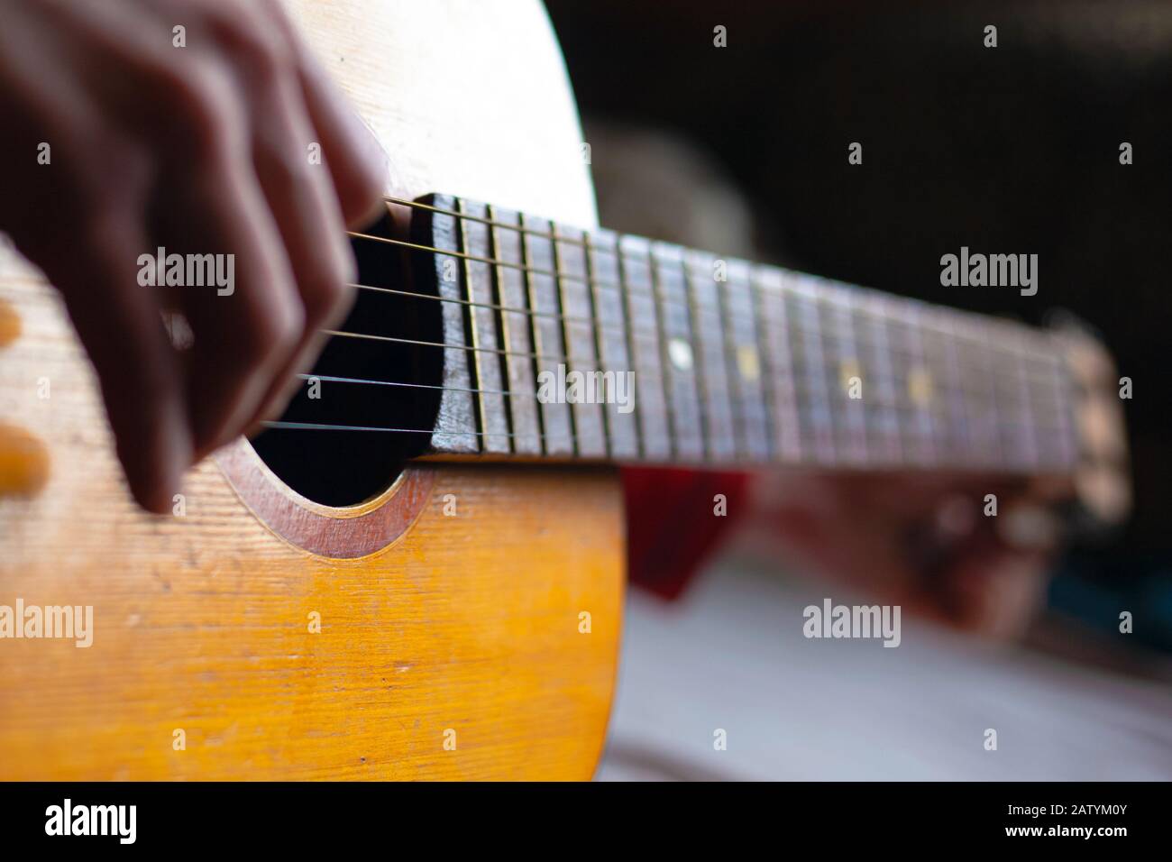 guitar strings. playing a musical instrument. guitar player Stock Photo ...