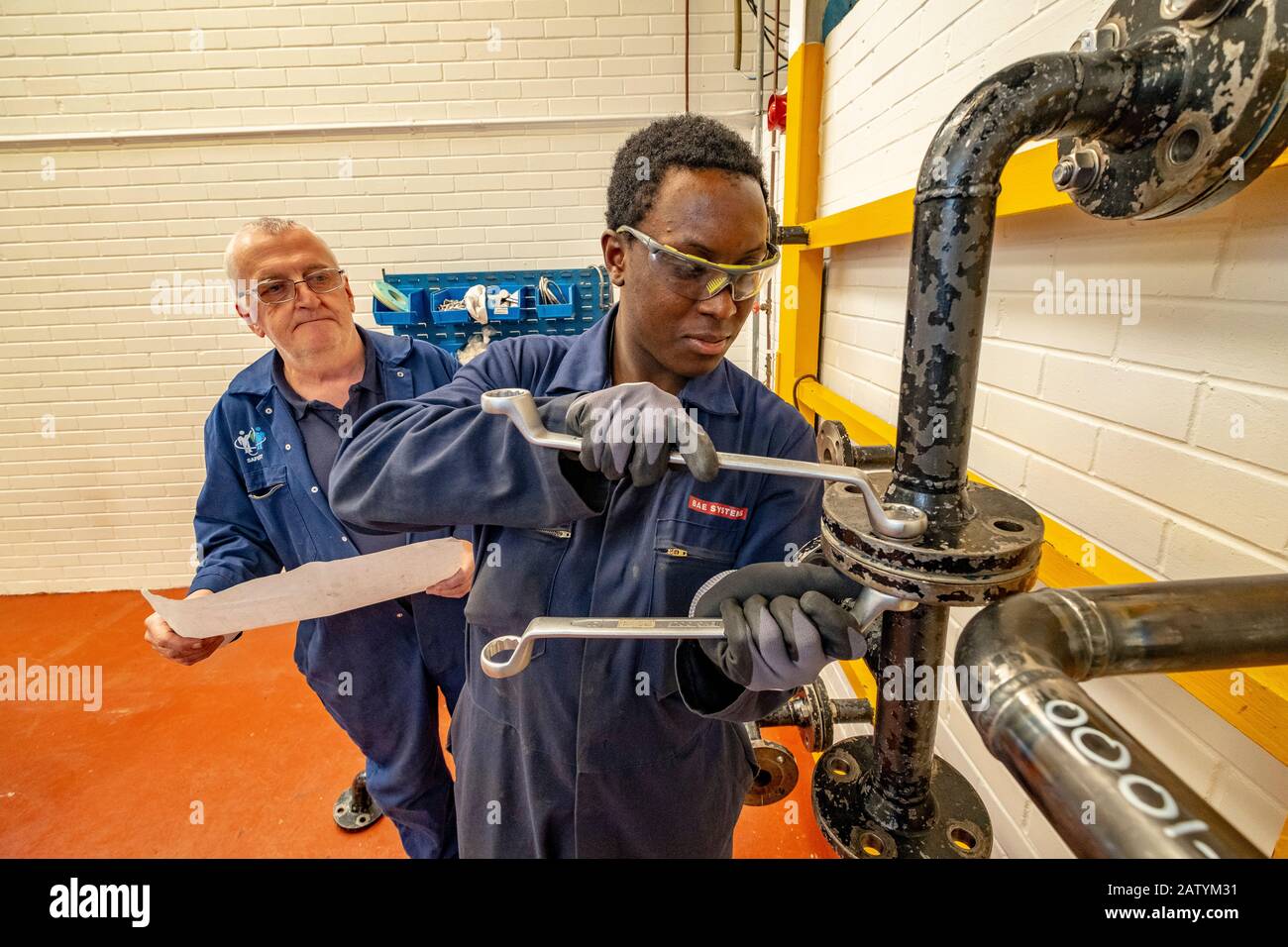 Apprentice engineers training Stock Photo