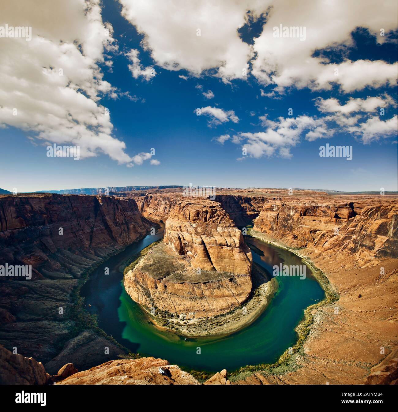 Blue river winding through a rocky canyon Stock Photo - Alamy
