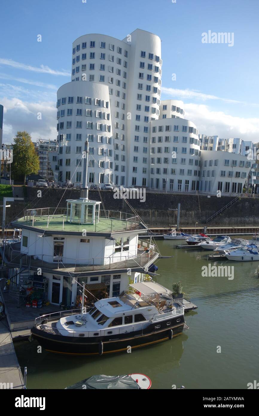 One of the Gehry buildings beside the harbour in the Medienhafen district of Dusseldorf. Stock Photo