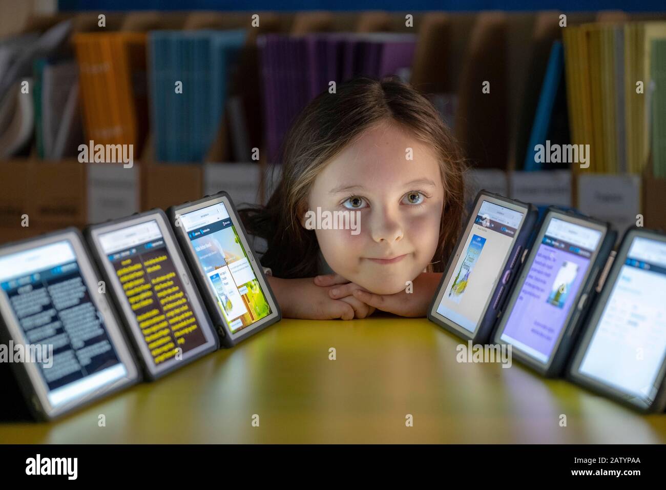 Primary School Children learning on-line Stock Photo - Alamy