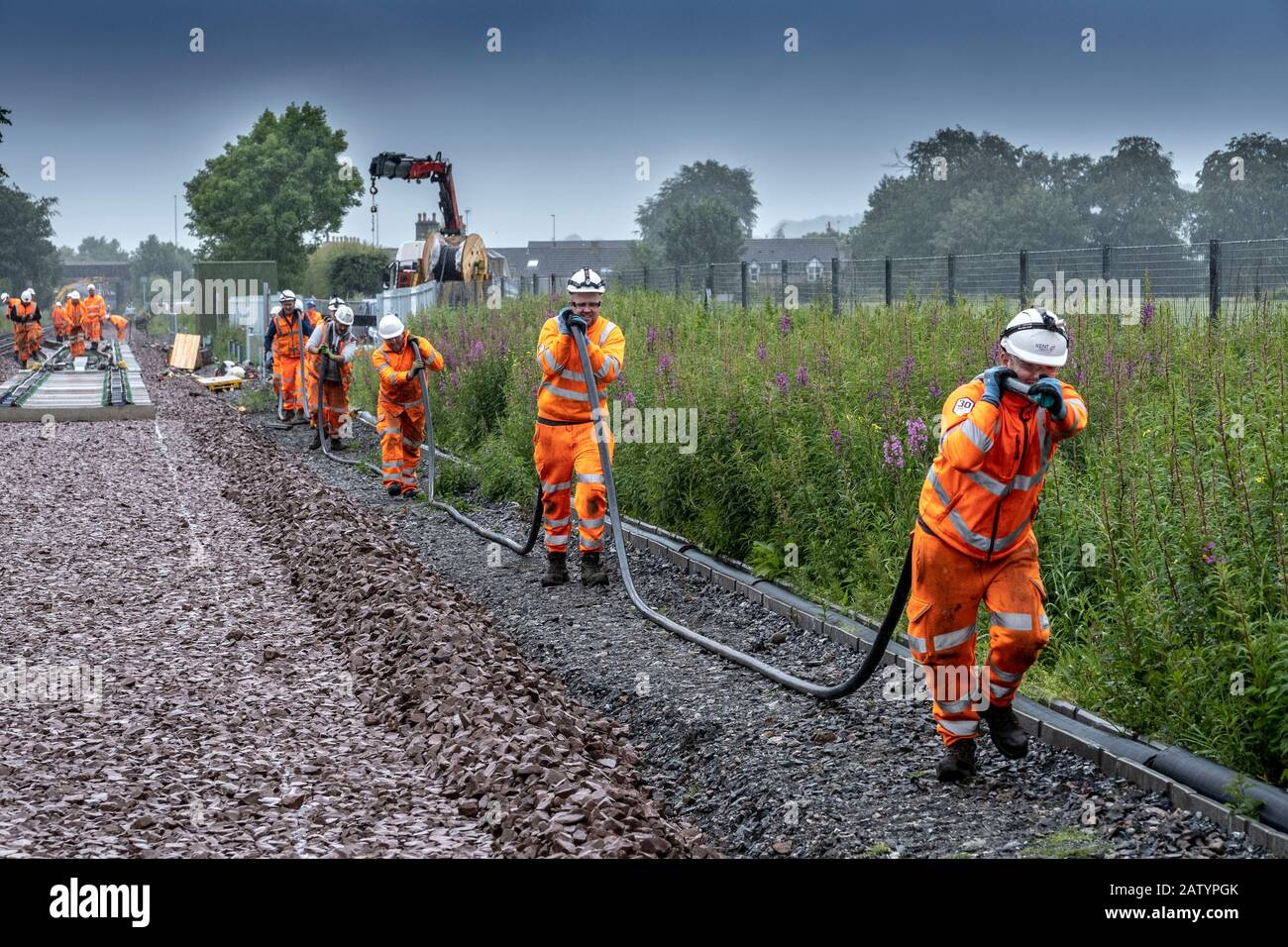 Cable laying by railway Stock Photo