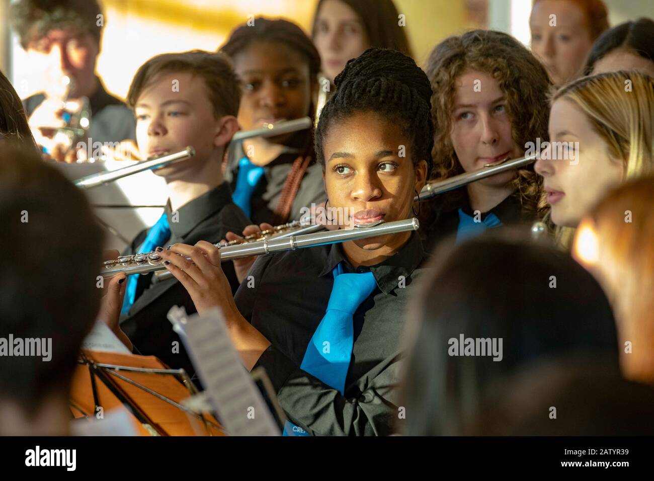 Children and young people playing in youth orchestra Stock Photo