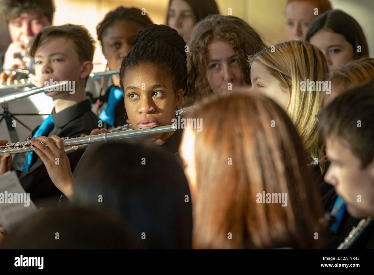 Children and young people playing in youth orchestra Stock Photo