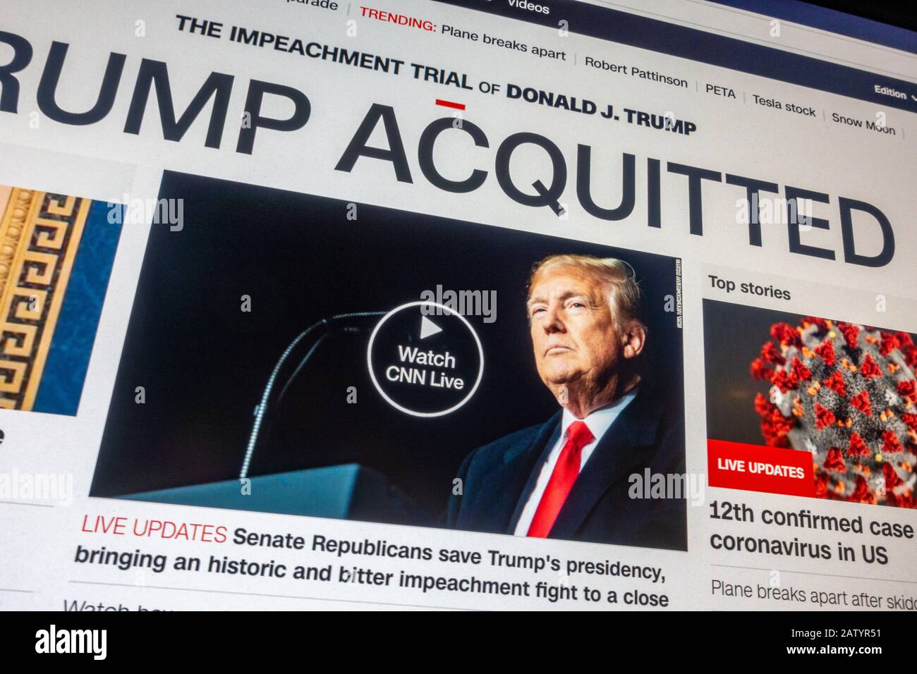 Breaking News on CNN website of President Donald J Trump is acquitted of both Impeachment charges on 5th February 2020. Stock Photo