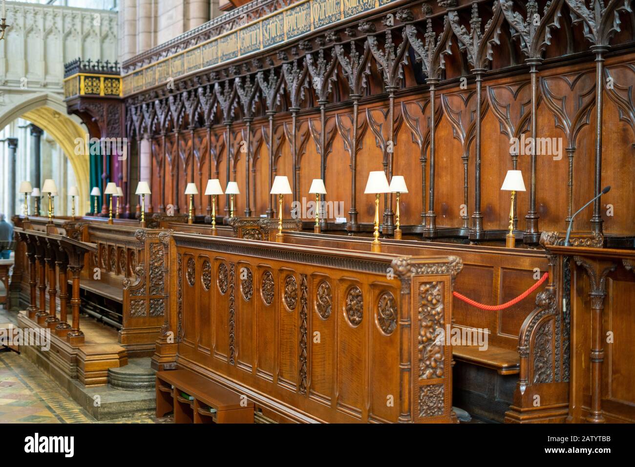 the wooden choir stalls or quire in a cathedral Stock Photo