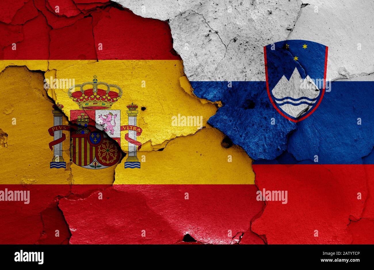 flags of Spain and Slovenia painted on cracked wall Stock Photo - Alamy