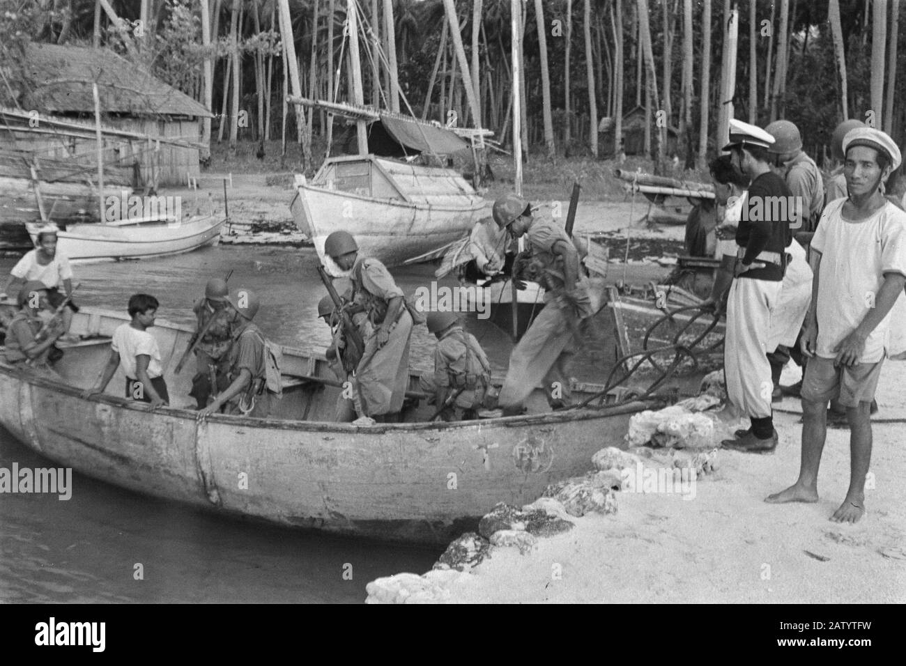 Borneo Soldiers board a sloop Date February 1947 Location Borneo