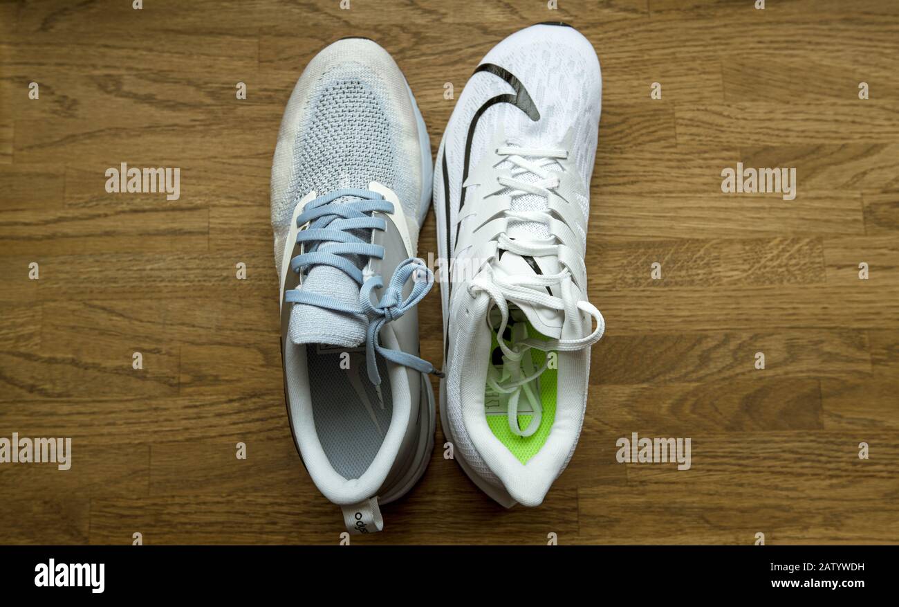 Paris, France - Sep 23, 2019: Overhead view professional running shoes  manufactured by Nike comparing two Odyssey React Flyknit 2 and Zoom Rival  Fly for women Stock Photo - Alamy