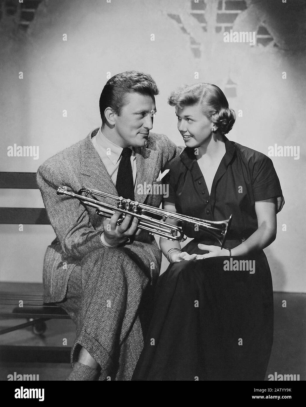 ***FILE PHOTO*** Kirk Douglas Has Passed Away At 103 Years Of Age. KIRK DOUGLAS With Doris Day in Young Man With a Horn *Filmstill - Editorial Use Only* CAP/PLF Supplied by Capital Pictures /MediaPunch ***NORTH AND SOUTH AMERICAS ONLY*** Stock Photo