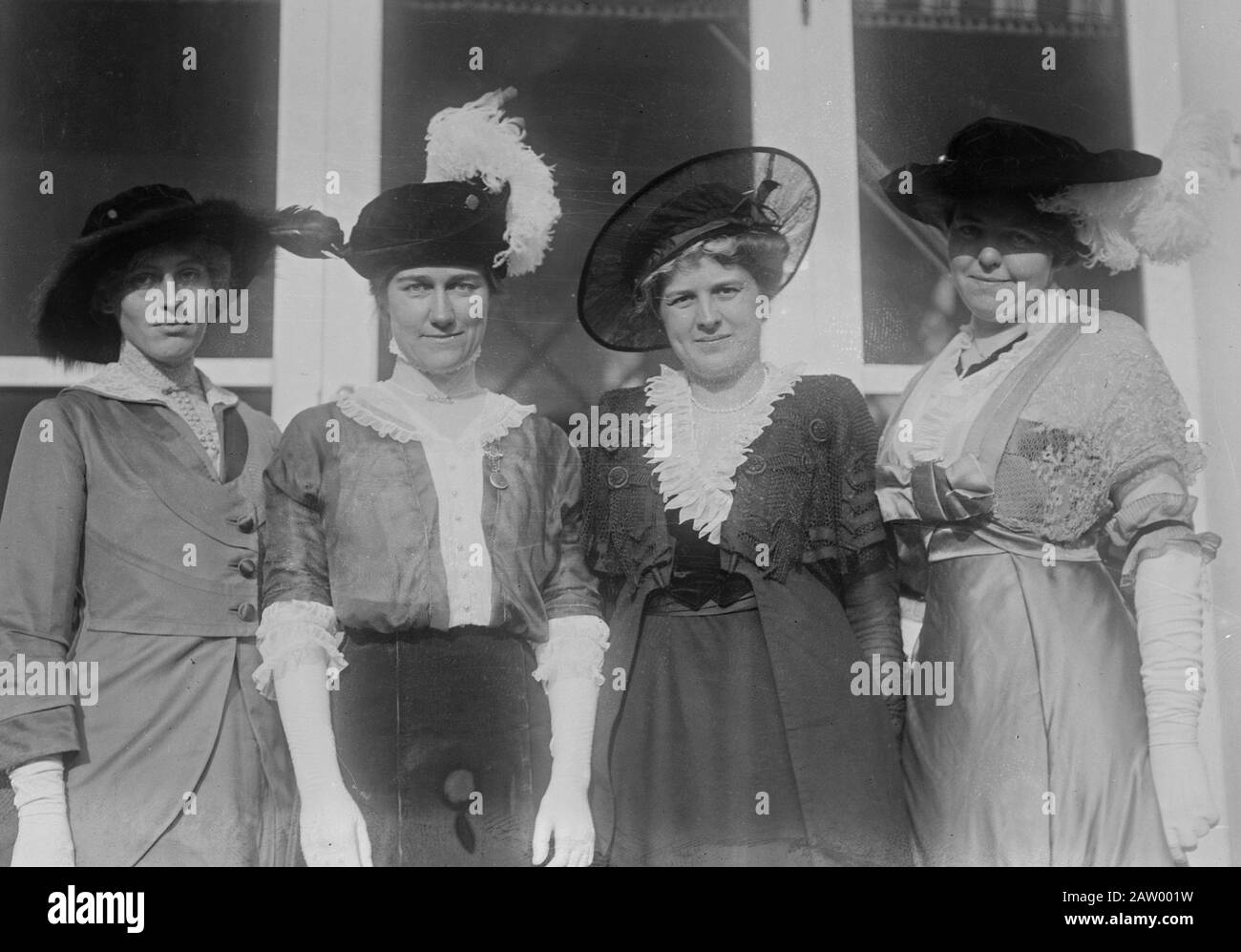 Photo shows activist Jessie Woodrow Wilson Sayre (1887-1933), daughter of U.S. President Woodrow Wilson; Miss Elizabeth W. Dodge (daughter of Cleveland Dodge), Mrs. D.H. Morris and immigration specialist Mrs Harry M. Bremer, possibly at a YWCA meeting, Oct. 21, 1913. Stock Photo