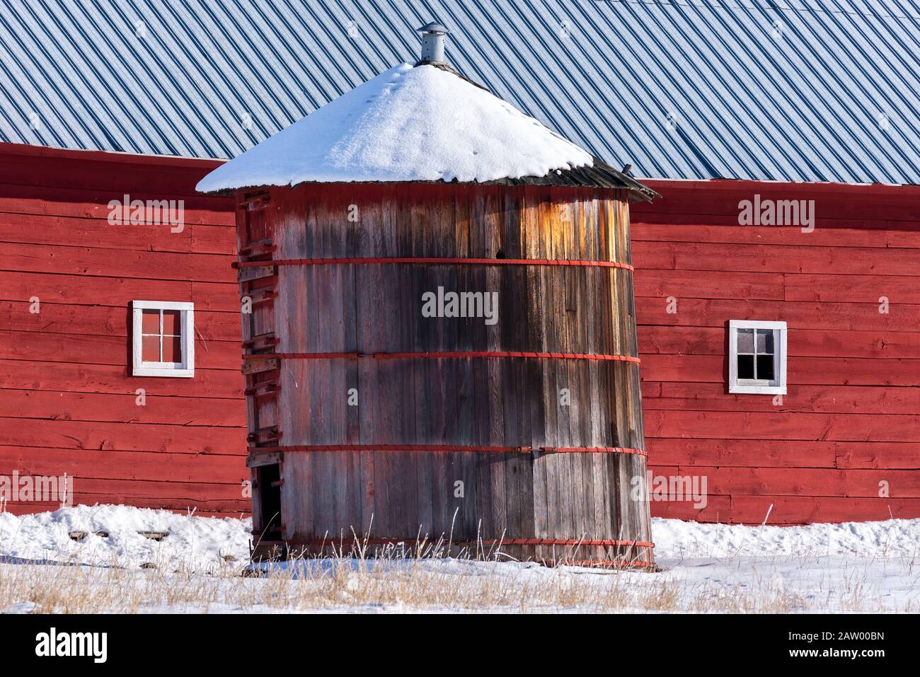 Old grain silo and barn on a farm in Wallowa County, Oregon Stock Photo