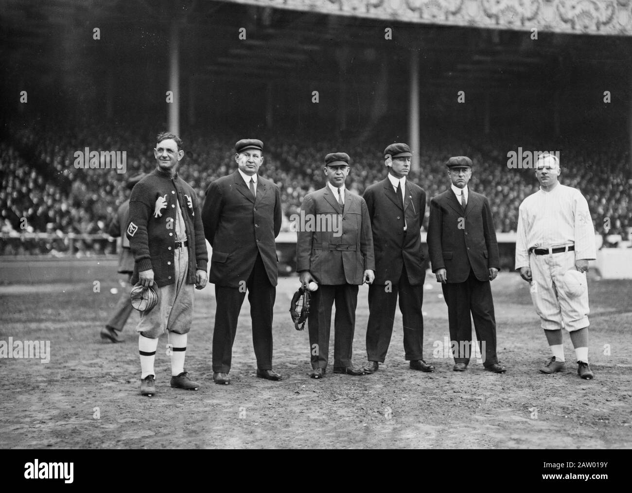 Photograph shows managers and umpires before Game One of the 1913 World Series on October 7 at the Polo Grounds in New York City. From left to right: Danny Murphy, Philadelphia Athletics team captain; Cy Rigler, left-field umpire; Bill Klem, home plate; John Joseph (Rip) Egan, infield; Tom Connolly, right field; and John McGraw, manager of the New York Giants. Stock Photo