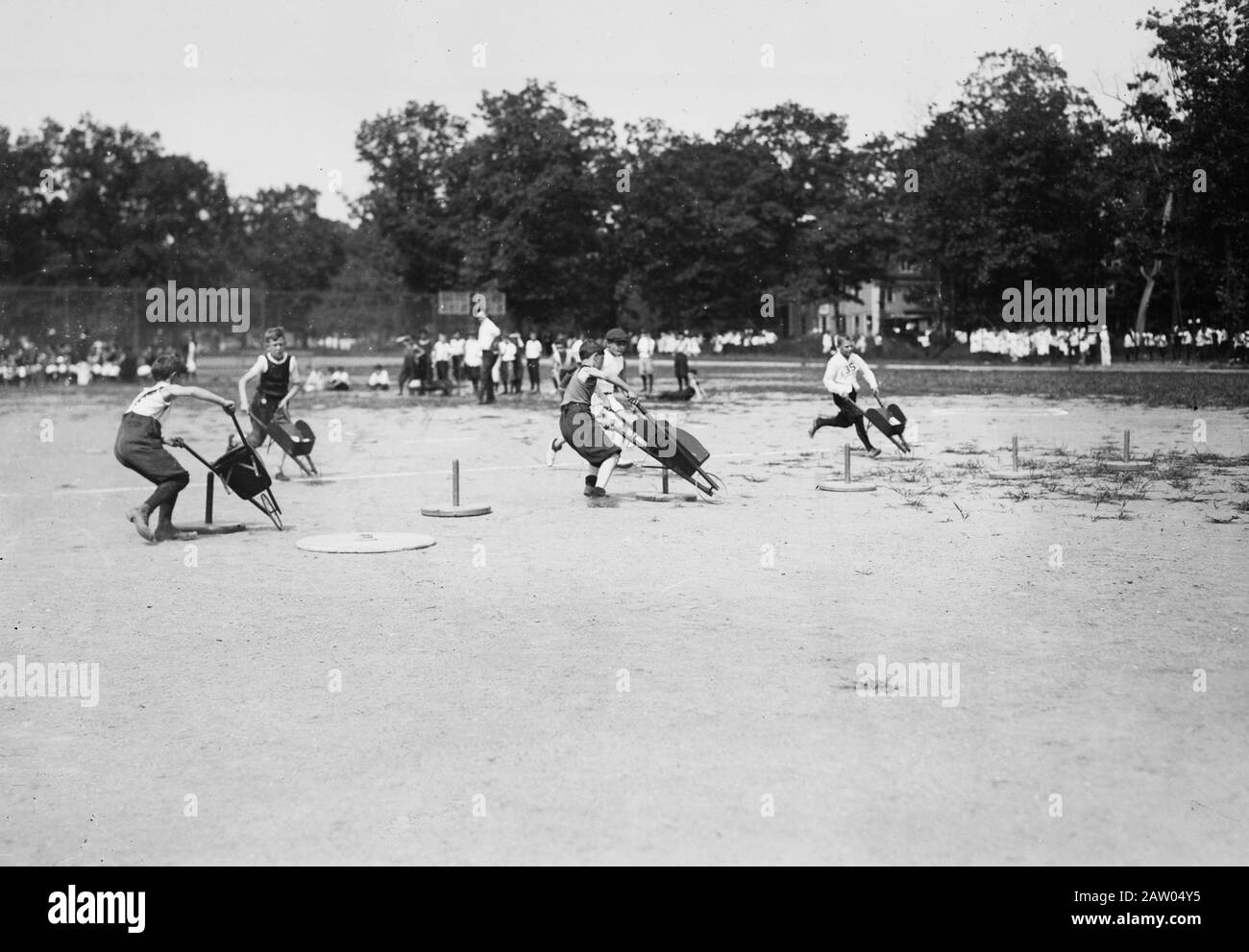 Brooklyn Children's Field Day [wheelbarrow race] [between ca. 1910 and