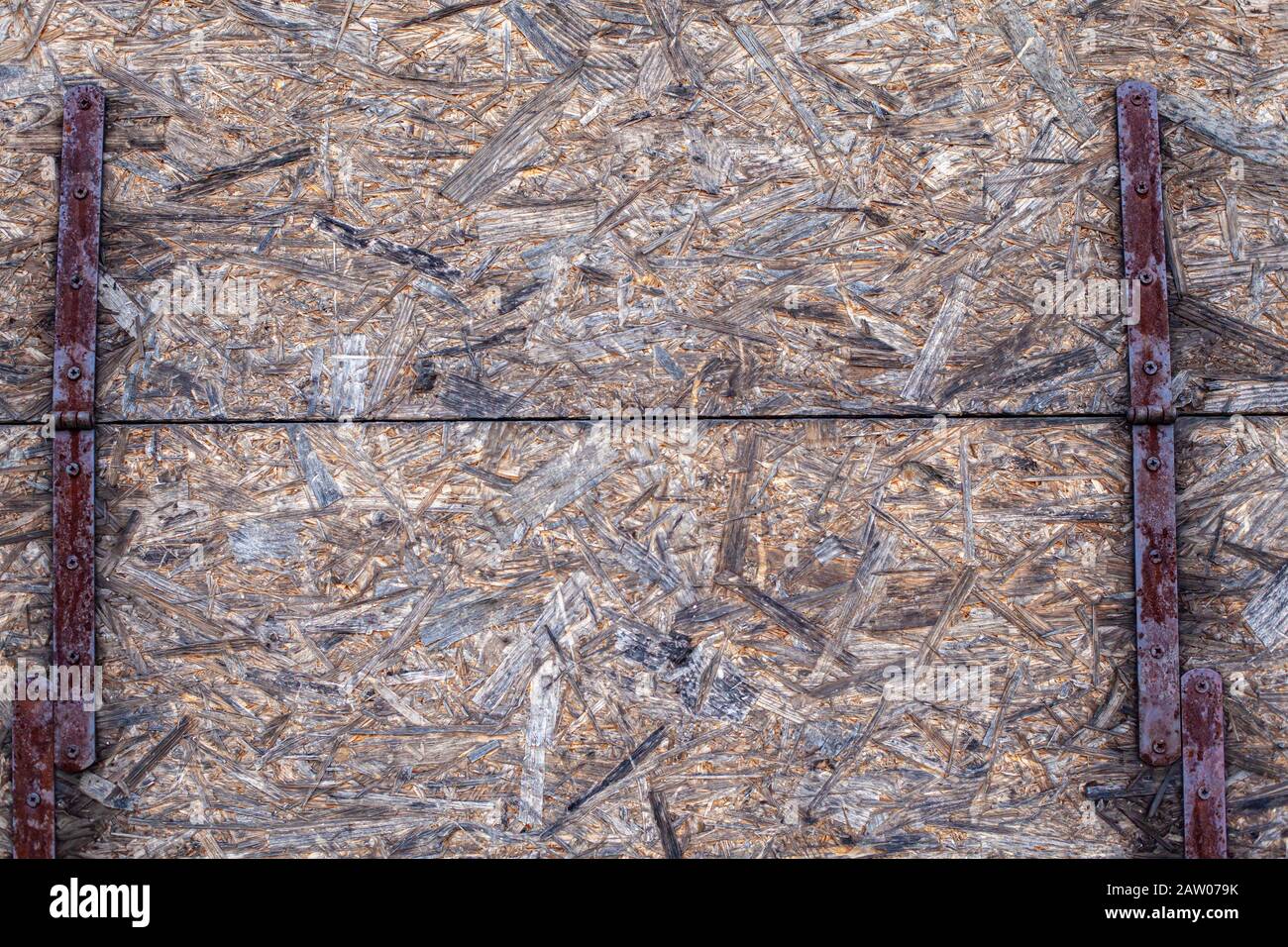 plastic of pressed wood connected by metal sheets Stock Photo - Alamy