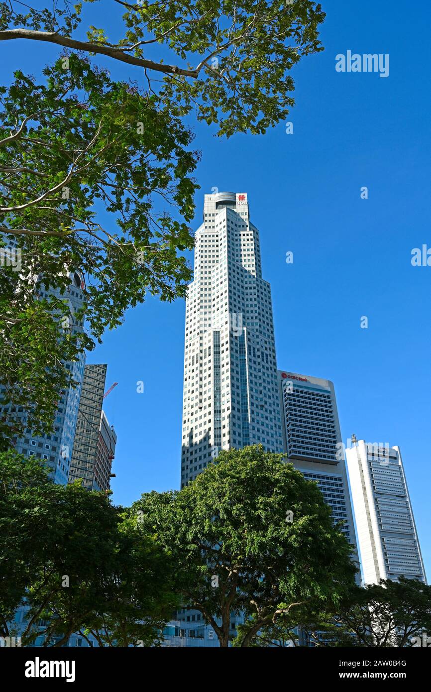 singapore, singapore - 2020.01.25: view from the opposite river banks onto high rise office buildings of central business district (cbd) Stock Photo