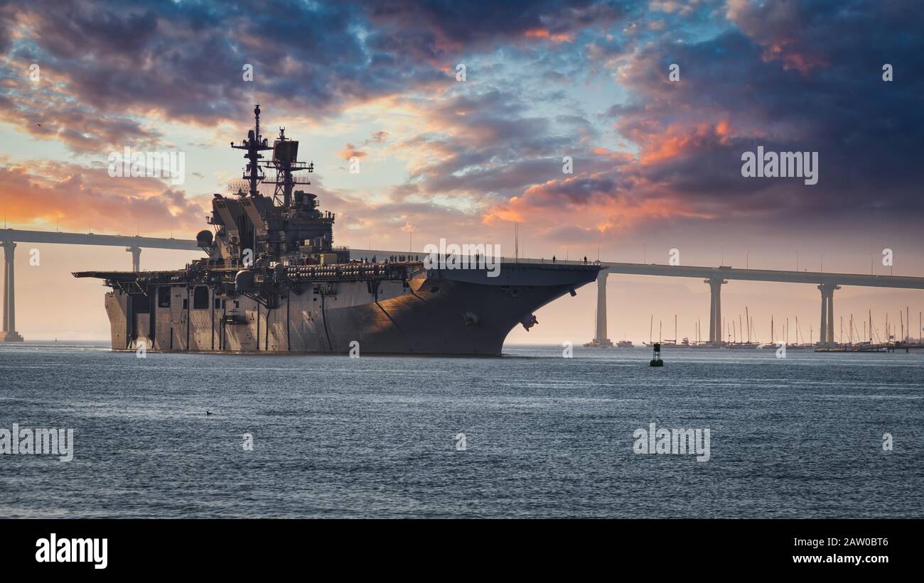 A US Navy ship departs San Diego Bay for the Pacific Ocean Stock Photo