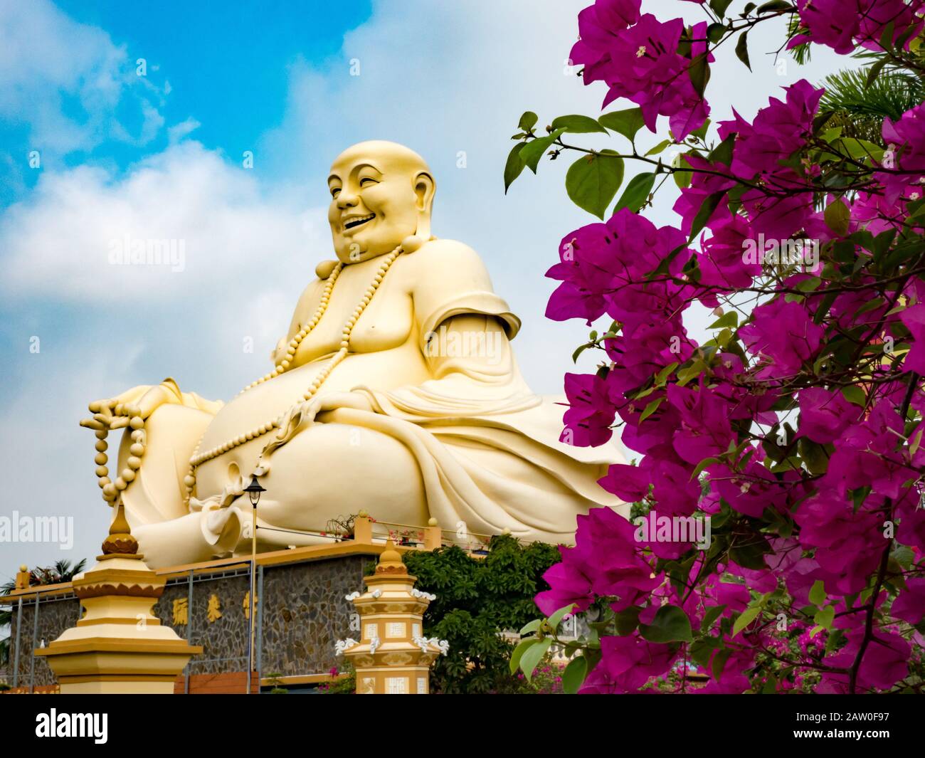 Giant Buddha at Vinh Trang Pagoda near My Tho, Vietnam Stock Photo