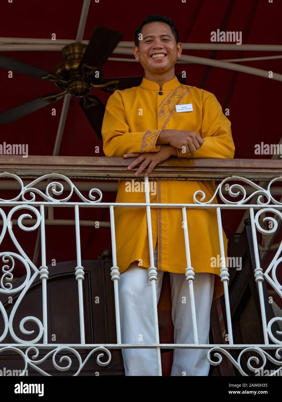 Sotha, a crew member onboard the expedition ship the Jahan on the Mekong river in Southeast Asia Stock Photo