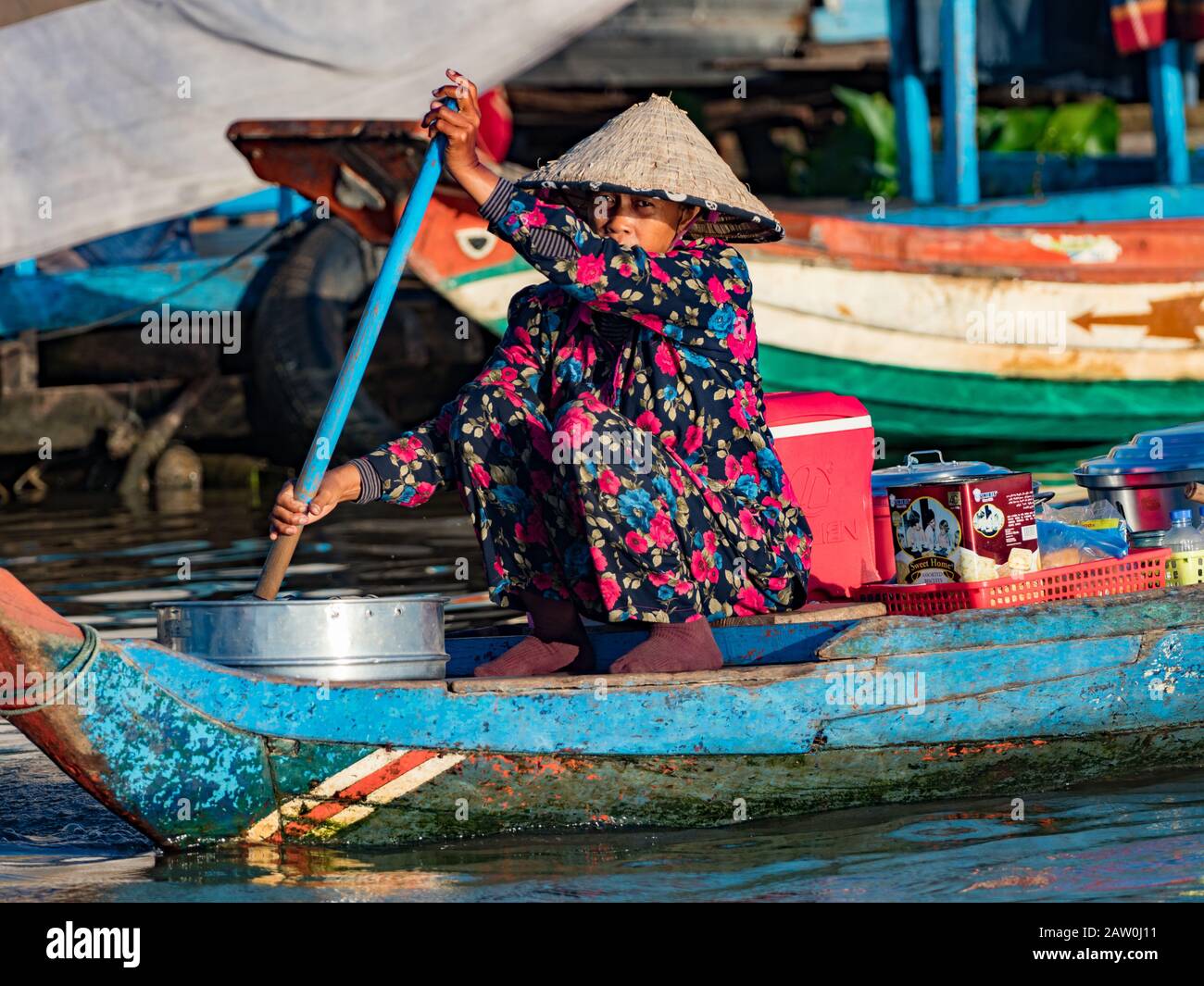 The people of Prek Toal on the Tonle Sap lake live in a floating village spending much of their life on the water in everything they do Stock Photo