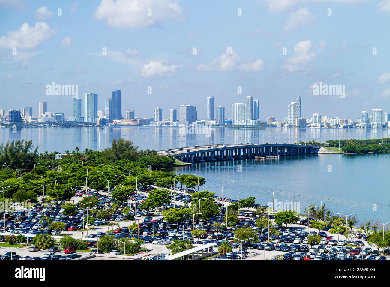 Florida, FL, South, Miami Beach, SoBe, Biscayne Bay, parking lot, cars, Julia Tuttle Causeway, skyline, high rise rises skyscraper skyscrapers tall bu Stock Photo