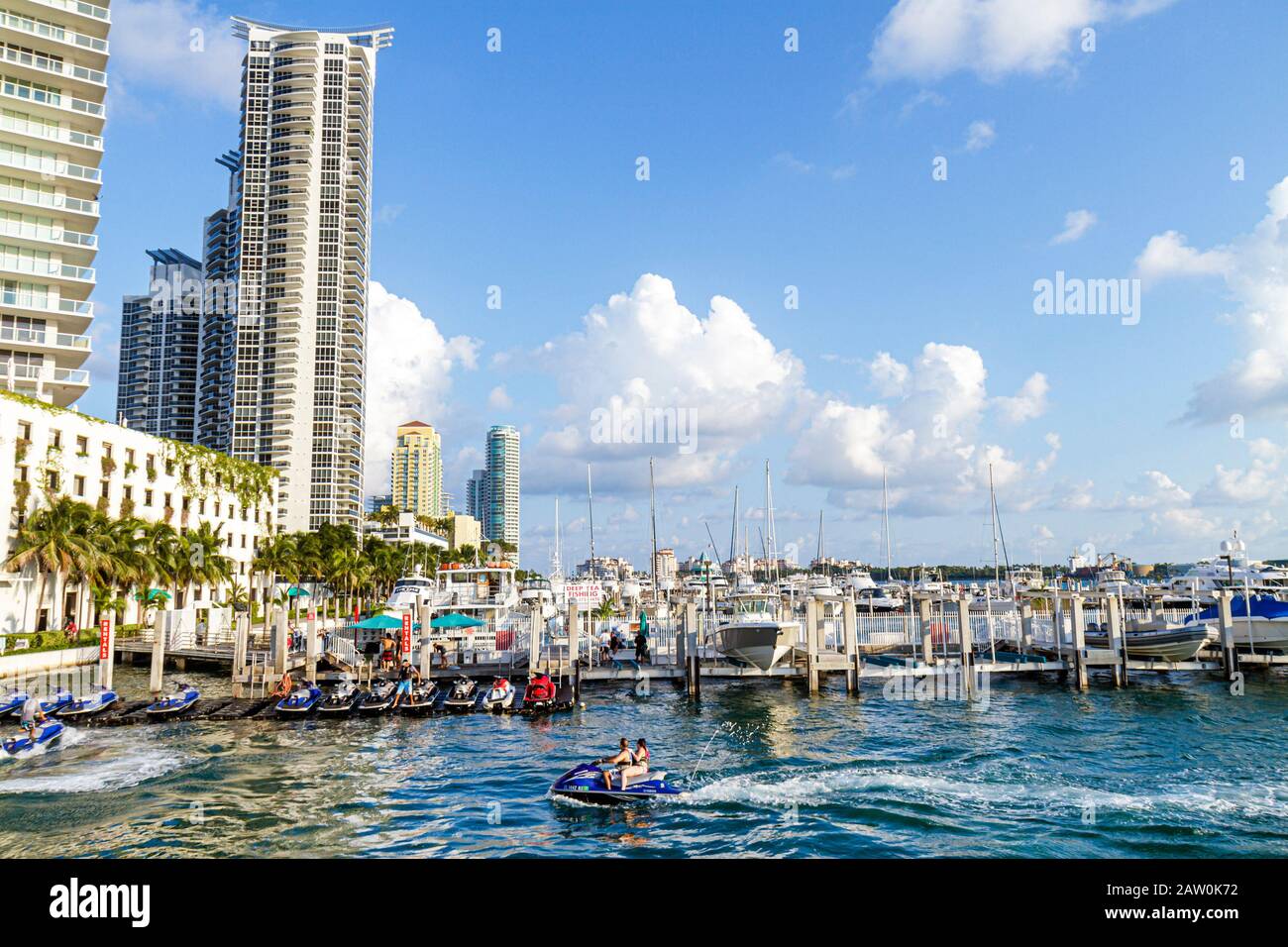 Miami Beach Florida,Marina,high rise,condominium residential apartment apartments building buildings housing,Biscayne Bay,rental jet ski,FL100919081 Stock Photo