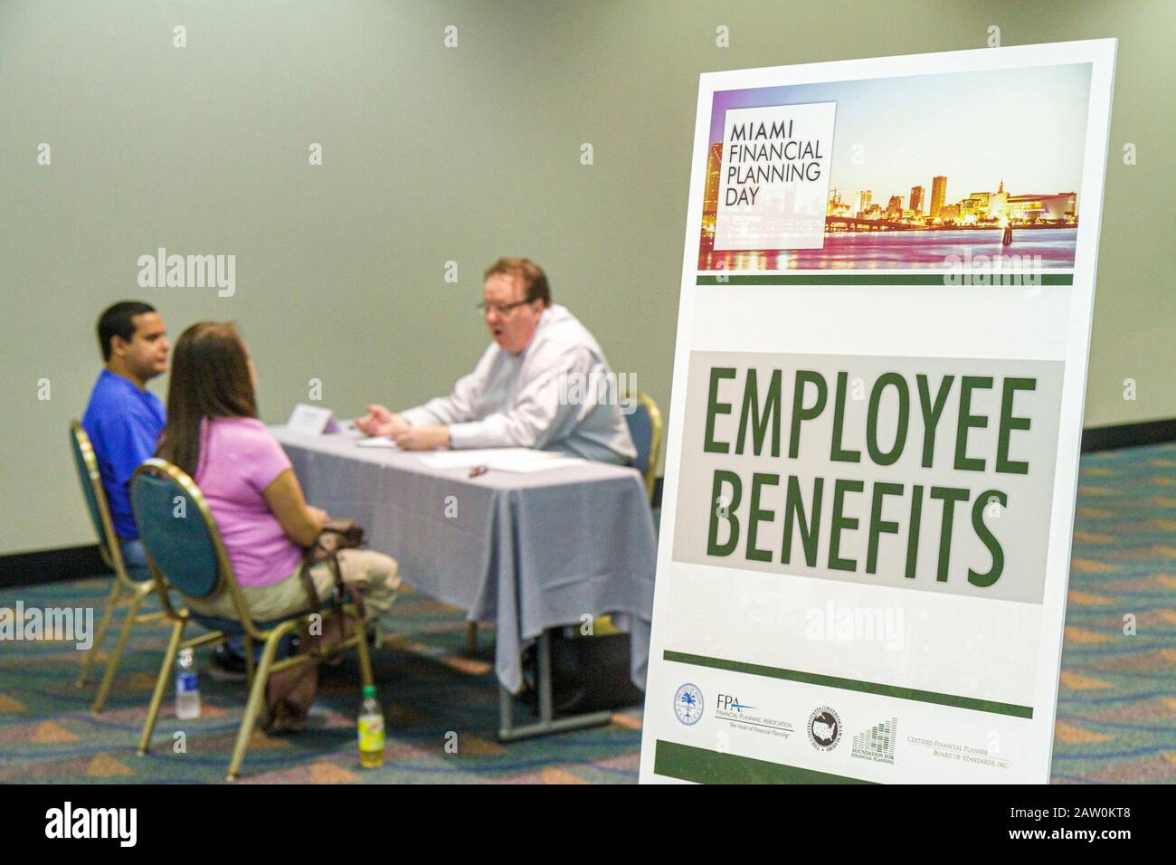 Miami Florida,James L. Knight Convention Center,Miami Financial Planning Day,free advice,guidanceal planners,man men male,woman female women,employee Stock Photo