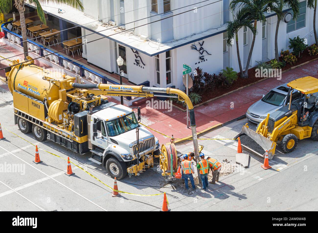 Miami Beach Florida,Ocean Drive,capital improvement,road repair,water pipeline,city workers,hard hats,sewer cleaning equipment,FL101031036 Stock Photo